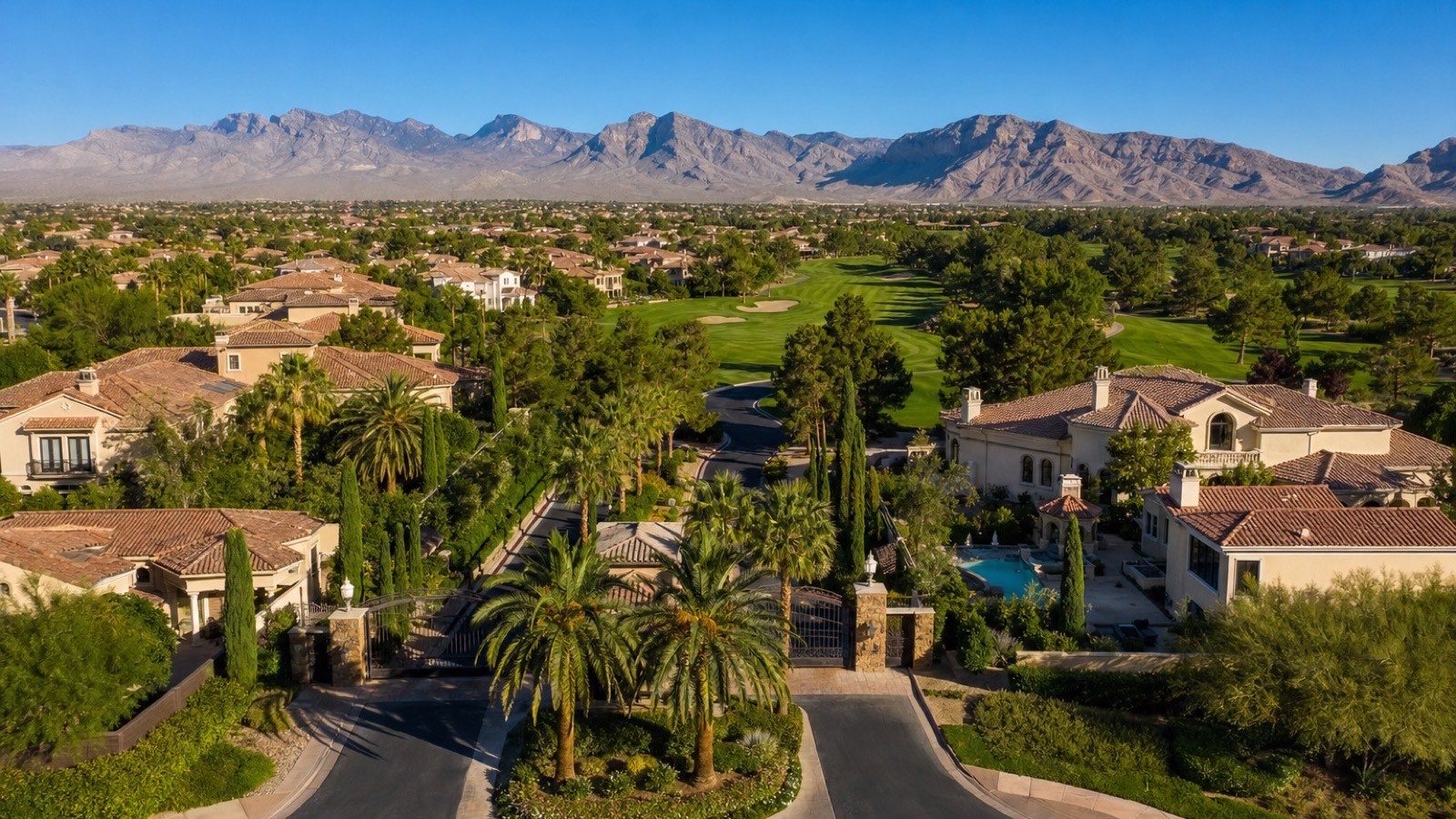 Mature guard-gated golf-community streetscape in Las Vegas, representative of the valley's affordable gated neighborhoods